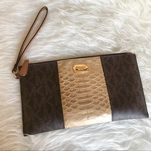 Used Michael Kors Jet Set LARGE zip clutch
